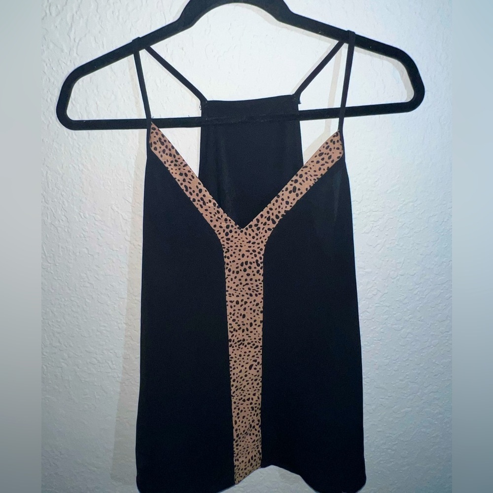 Black Shein tank top with a Cheetah prink stripe down the middle.